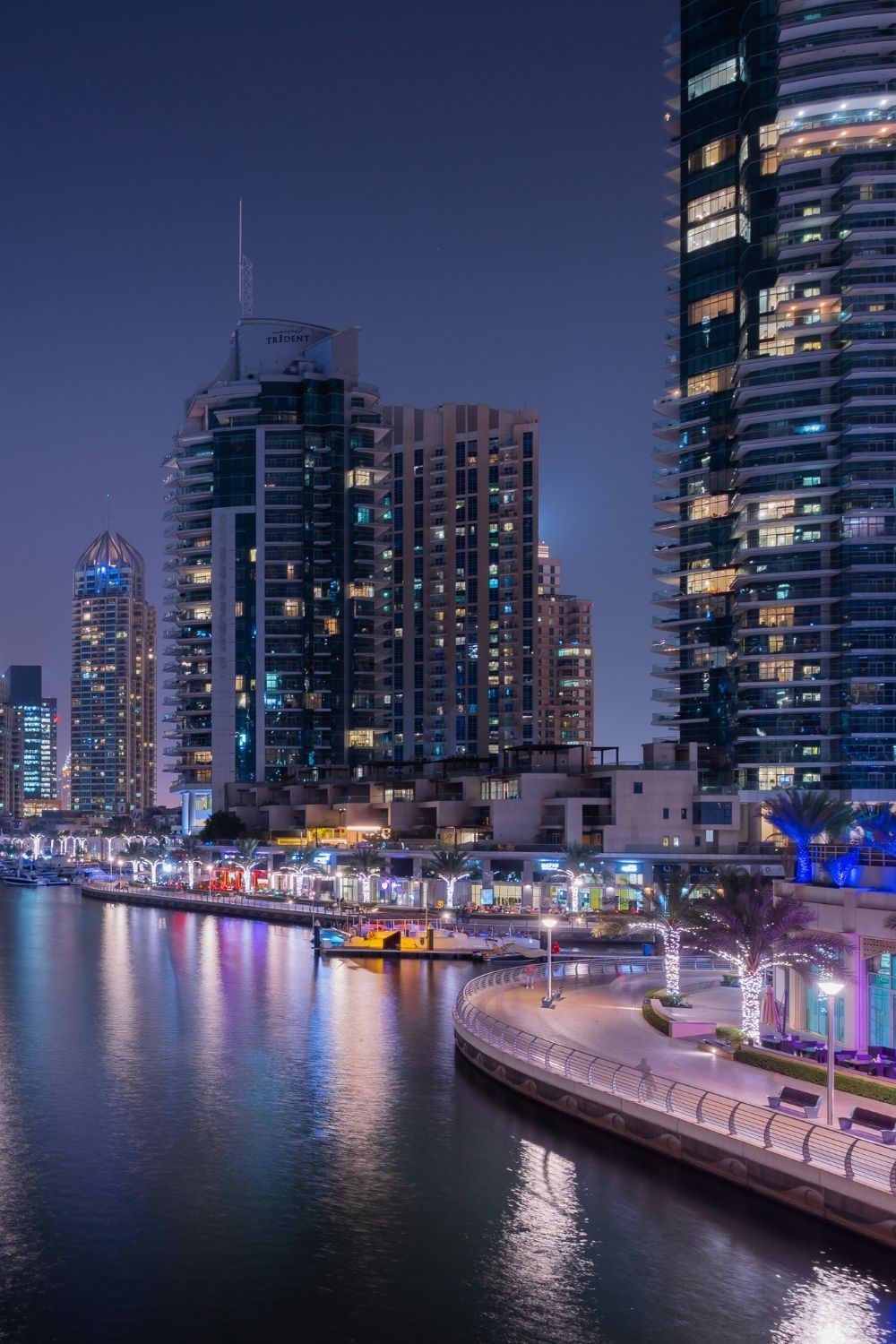 Dubai Business Bay waterfront skyline at night near modern office and residential towers